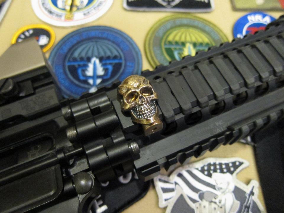 http://www.tacticalfanboy.com/wp-content/uploads/2012/01/Rail_Mounted_Skull.jpg